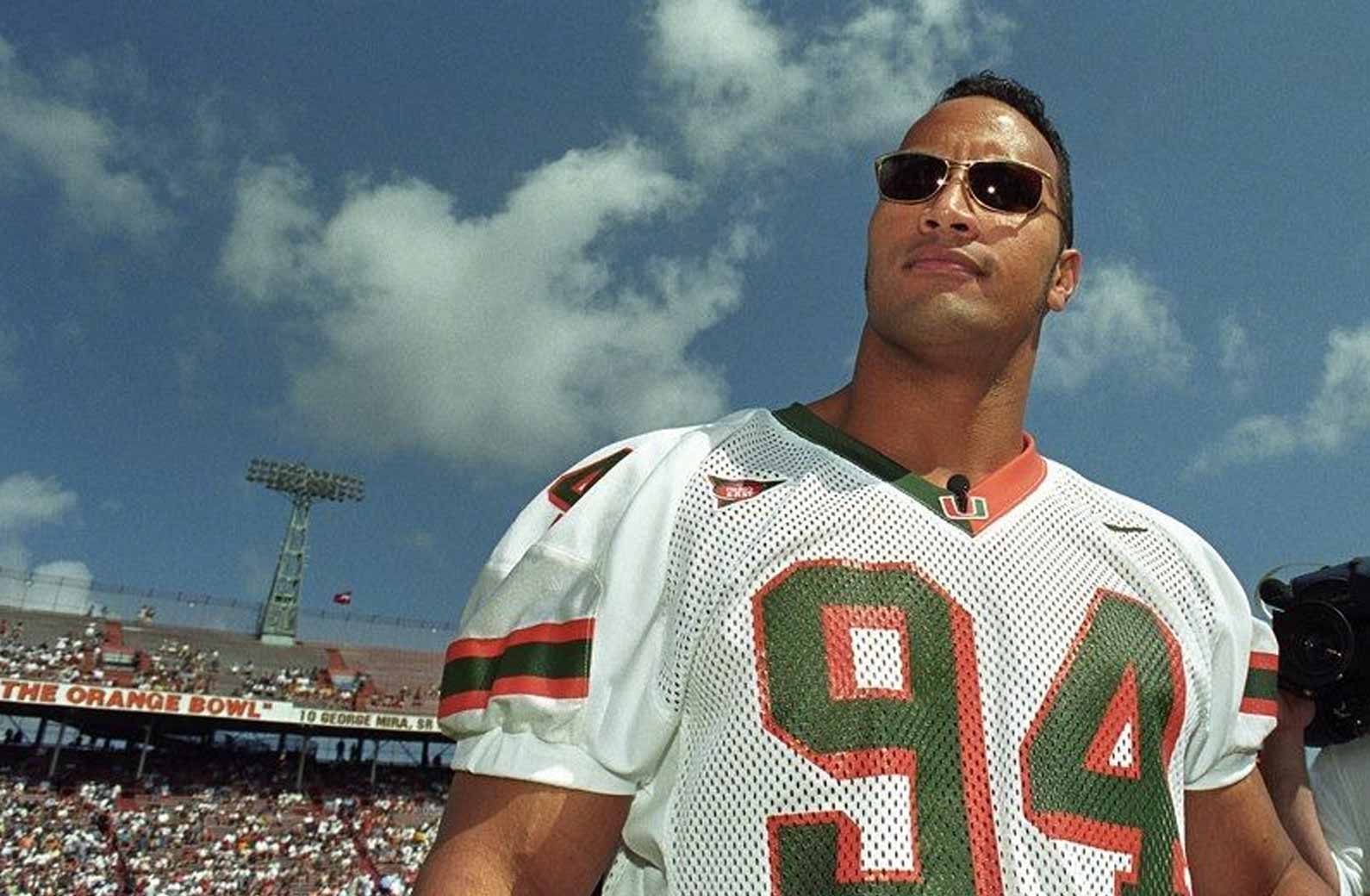 The Rock is a celeb that played with an NFL hall of famer.